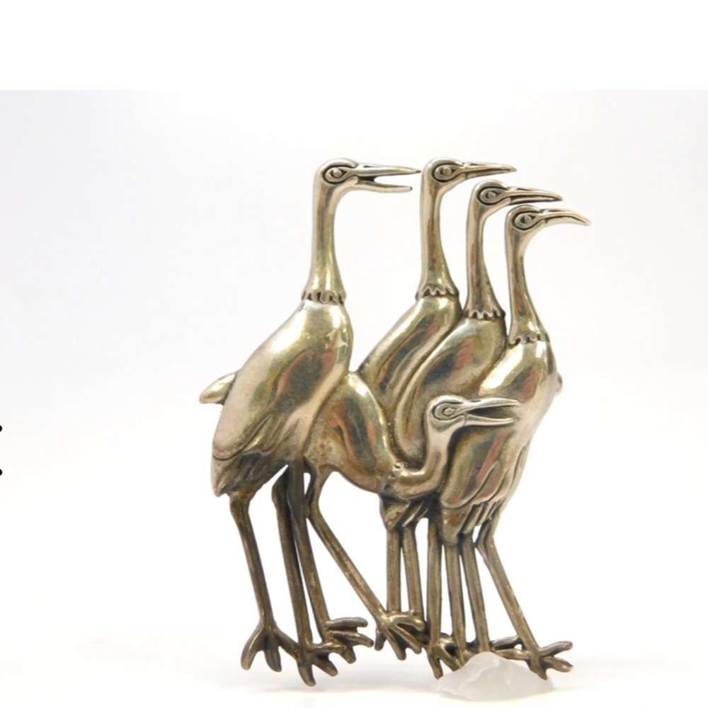 H & H sterling artistic crane decorative pin.